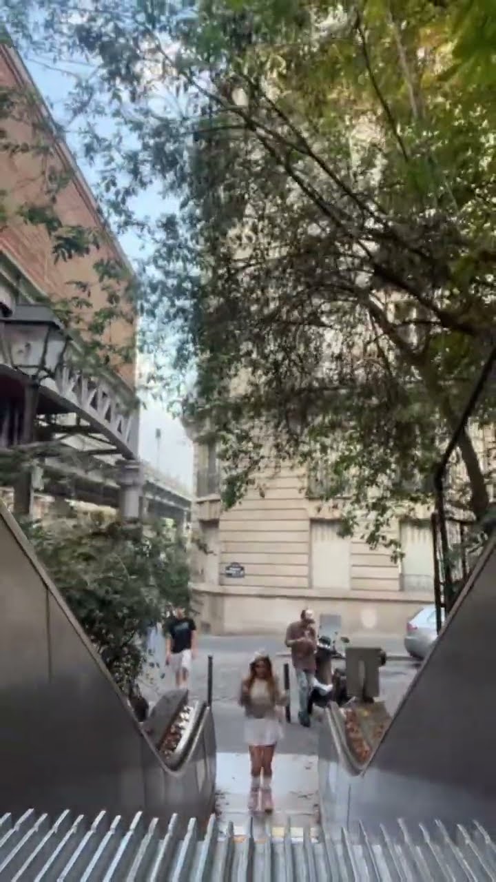 Escalator girl in Paris ☺️| Andra Gogan